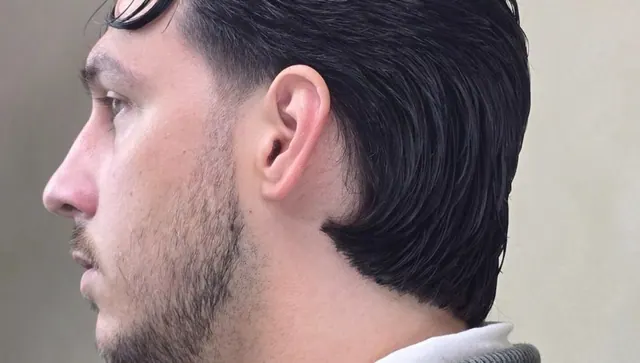 A tapered neckline, close up