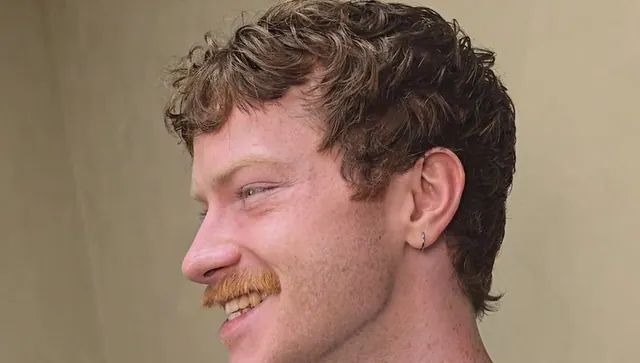 Loose curls with a light taper